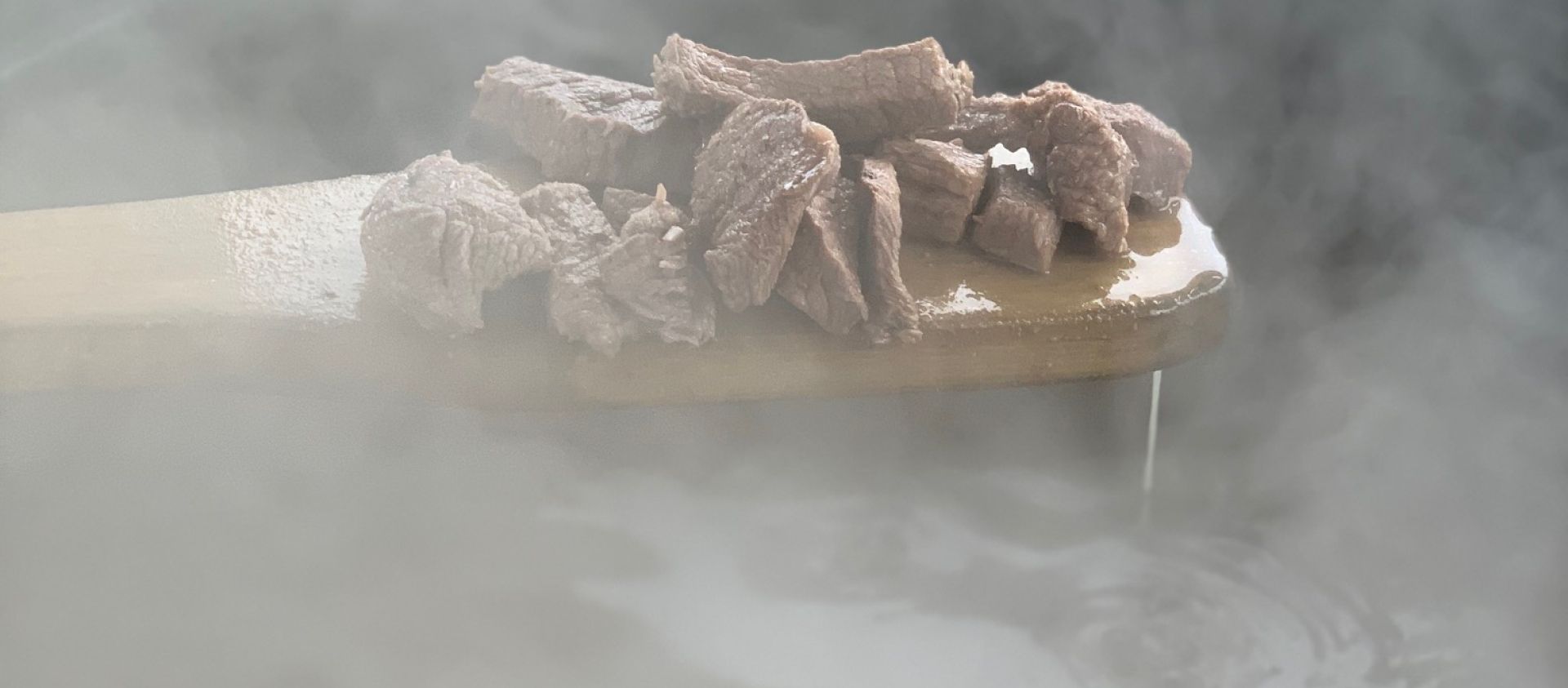 Meat cooking to be made into meat gravy, a traditional Wahzhazhe dish. 